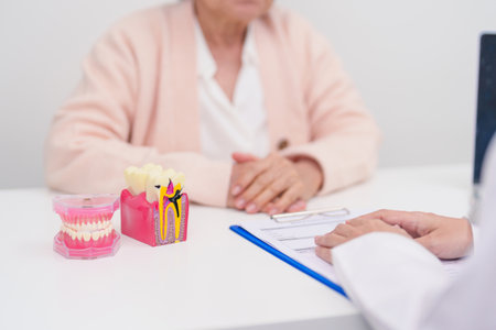 Elderly Patient consulting Dentist to Tooth disease, Senior Health Medical Diagnosis. Anatomy teeth...