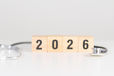 Happy New Year 2026 with Stethoscope of doctor and heart shape on table. health care, Insurance,...