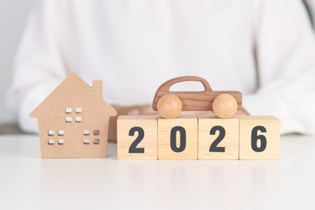 Happy New Year 2026 with house and Car model. real estate, Home mortgage and car loan, tax,...
