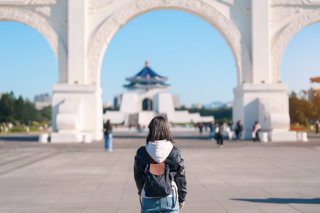 woman traveler visiting in Taiwan, female Tourist sightseeing at National Chiang Kai shek Memorial or Hall Freedom Square, Taipei City. Popular landmark and attractions. Asia Travel conceptの写真素材