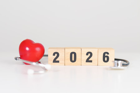 Happy New Year 2026 with Stethoscope of doctor and heart shape on table. health care, Insurance,...
