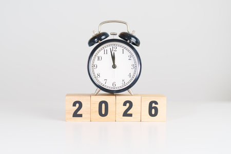 Happy New Year 2026 with vintage alarm clock. Christmas, New Start, Resolution, countdown, Goals, Plan, Action and Motivation Conceptの写真素材