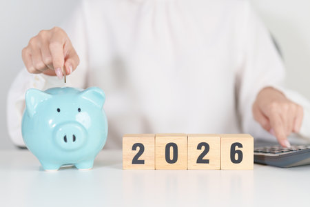 Happy New Year 2026 with piggy bank. Resolution, Goals, Plan, Action, Money Saving, Retirement fund,...