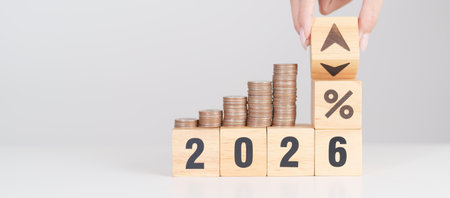 2026 New year with percentage change to UP and Down arrow with coin stack. Interest rate, GDP,...