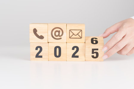 Happy New Year 2026 block for Contact Us concepts. Wood block of Email, call Phone and Website Address sign. For Customer support hotline, business Marketing, Corporate, communication and Advertisingの写真素材