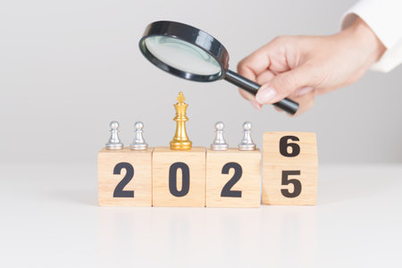2025 end year to Happy New Year 2026 with magnifying glass and people. hiring, employee, recruitment, job, SEO and jobless, Human resource management, Recruitment, leadership and peopleの写真素材