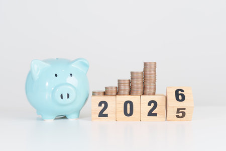 2025 end year to Happy New Year 2026 with piggy bank. Resolution, Goals, Plan, Action, Money Saving,...