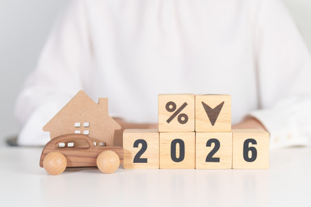 2026 New Year with percentage change to UP and Down arrow with car and Home model. Car loan,...