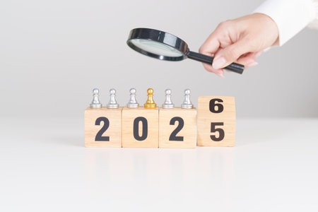 2025 end year to Happy New Year 2026 with magnifying glass and people. hiring, employee, recruitment, job, SEO and jobless, Human resource management, Recruitment, leadership and peopleの写真素材