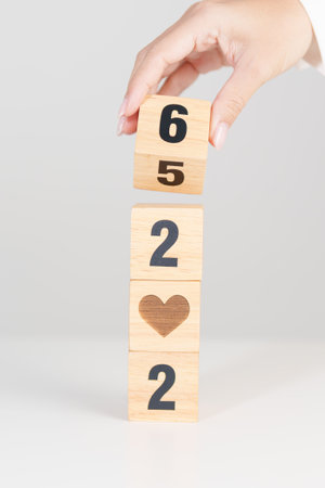 2025 end year to Happy New Year 2026 with heart block for health care, love, organ donation, resolution, charity, happy family, wellbeing and insurance conceptsの写真素材