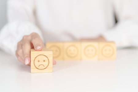 Woman show Unhappy Sad face block, Mental health Assessment, Psychology, Health Wellness, Feedback, Customer Review, Experience, Satisfaction Survey, Negative Thinking and World Mental Health dayの写真素材