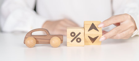 Percentage block change to UP and Down arrow with car model. Car loan and debt, Interest rate, Insurance, Financial, vehicle Repair, Automobile Tax, mortgage and economic recessionの写真素材