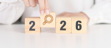 2026 year block with magnifying glass icon. SEO, Search Engine Optimization, hiring , Advertising,...