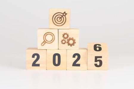 Happy New Year 2026 block with wood block with business goal, strategy, target, mission, action,...