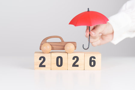 Happy New Year 2026 with red umbrella. car Insurance, Financial, vehicle Repair and Maintenance,...