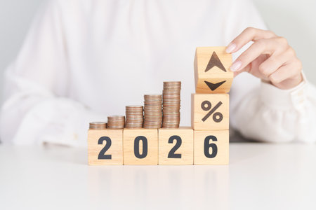 2026 New year with percentage change to UP and Down arrow with coin stack. Interest rate, GDP,...