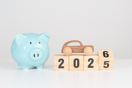 2025 end year to Happy New Year 2026 with car model and Coins Money stack for deposit and Tax. Money...