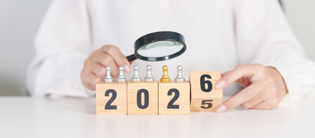 2025 end year to Happy New Year 2026 with magnifying glass and people. hiring, employee, recruitment, job, and jobless, Human resource management, Recruitment, leadershipの写真素材