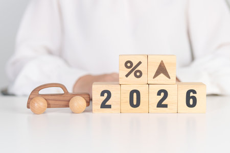 2026 New Year with percentage change to UP and Down arrow with car model. Car loan, Interest rate,...