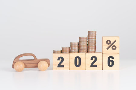 2026 New Year with percentage change to UP and Down arrow, car model and coin stack. Car loan,...