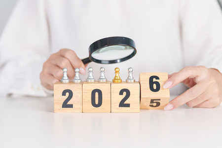 2025 end year to Happy New Year 2026 with magnifying glass and people. hiring, employee,...