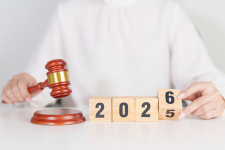 2025 end year to Happy New Year 2026 with judge gavel on table. Law, lawyer, judgment, justice...