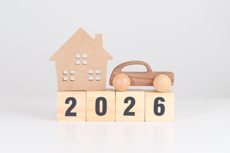 Happy New Year 2026 with house and Car model. real estate, Home mortgage and car loan, tax, investment, financial, savings, interest rate, economic recession and New Year  conceptsの写真素材