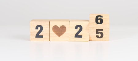 2025 end year to Happy New Year 2026 with heart block for health care, love, organ donation, resolution, charity, happy family, wellbeing and insurance conceptsの写真素材