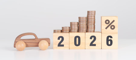 2026 New Year with percentage change to UP and Down arrow, car model and coin stack. Car loan, Interest rate, Insurance, Financial, vehicle Repair, Automobile Tax, mortgage and Maintenanceの写真素材