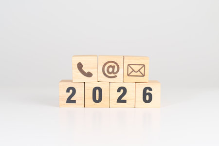 Happy New Year 2026 block for Contact Us concepts. Wood block of Email, call Phone and Website...