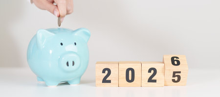 2025 end year to Happy New Year 2026 with piggy bank. Resolution, Goals, Plan, Action, Money Saving,...
