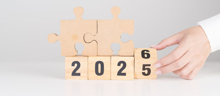 2025 year change to 2026 year block with jigsaw puzzle icon. Business Process, Team, teamwork, Goal,...