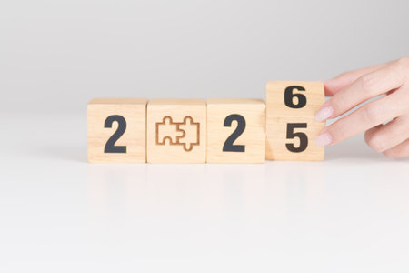 2025 year change to 2026 year block with jigsaw puzzle icon. Business Process, Team, teamwork, Goal,...