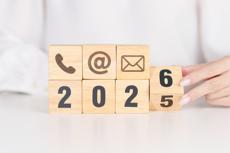 Happy New Year block for Contact Us concepts. Wood block of Email, call Phone and Website Address...