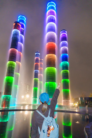 Happy woman traveler travel in Chengdu city. Famous Landmark for tourism attraction in Sichuan,...