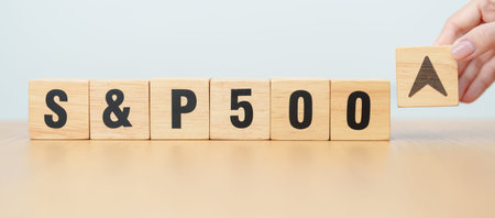 Hand change wooden block of SP500 text to UP and Down arrow symbol icon. stock market index, trade,...