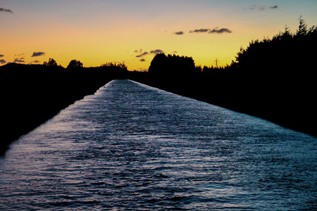 tranquil river during early morning, sunrise in Methven, New Zealandの写真素材
