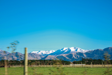 snow capped mountains and hills in Ashburton Lakes District, South Island, New Zealandの写真素材