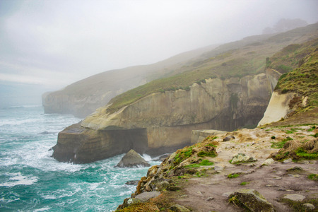 Tunnel Beach during early morning hours, near Dunedin, Otago, South Island, New Zealandの写真素材