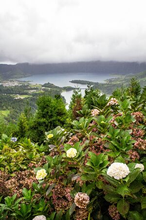 View over Sete Cidades Lakes from Vista do Rei viewpoint on a cloudy day, Sao Miguel Island, Azores, Portugalの写真素材
