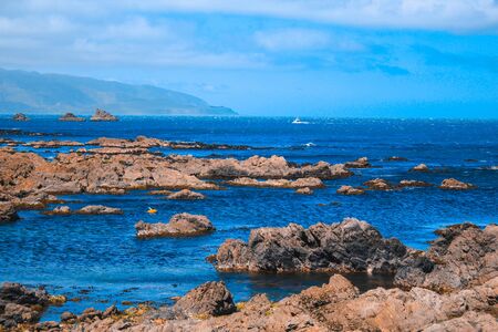 Beautiful coastline at Owhiro Bay in Wellington, North Island, New Zealandの写真素材
