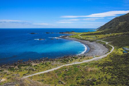 View of coastline at Cape Palliser lighthouse, North Island, New Zealandの写真素材