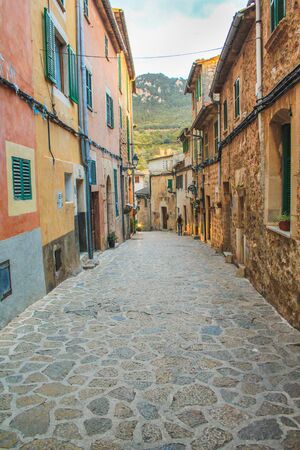 empty street with cobble stones in Valldemossa, Mallorca, Spain