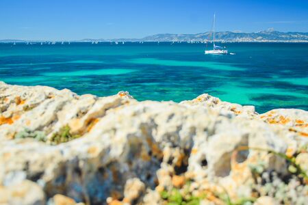 summer weather in Spain. view over beautiful coast with sailing boats in the south of Mallorca,...