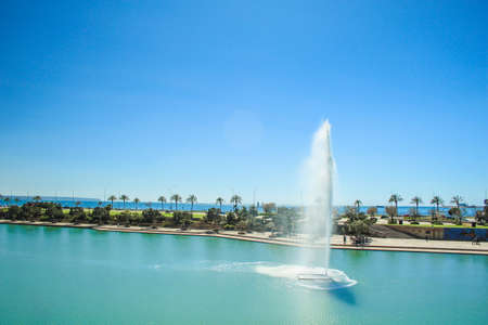 Palma, Mallorca / Spain - March 26 2018: Parc de la mar with its blue pool and fountain located in the capital Palma de Mallorca, both the city and the park are popular with touristsのeditorial素材