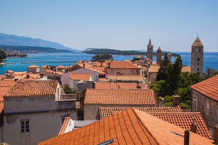 View over Rab town on Rab island on a cloudless summer day, in Croatiaの写真素材
