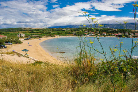 Novalja, Pag Island, Croatia - July 23 2018: Wild landscape and beach near Novalja.