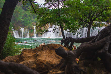 Krka National Park, Croatia - July 27 2018: Wild landscape and waterfall at famous tourist attraction in Croatiaのeditorial素材