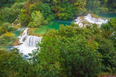 Krka National Park. Waterfall and wild landscape at famous tourist attraction in Croatiaの写真素材