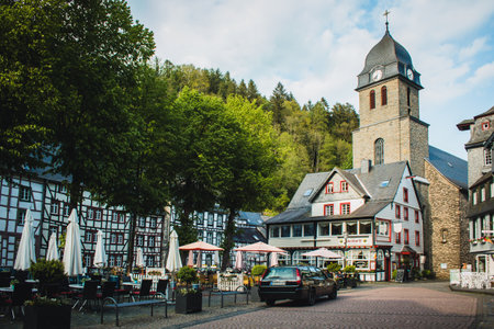 MONSCHAU, GERMANY - MAY 22nd 2019: Small picturesque town in the Eifel region in Noth Rhine-Westphalia. It is famous for its half-timbered houses and cobblestone streetsのeditorial素材